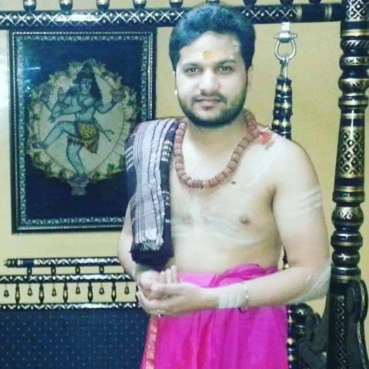 Gaurav in traditional dress, ready for pooja