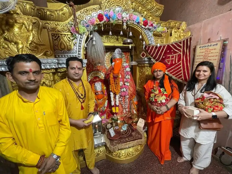 Gaurav at a temple with devotees