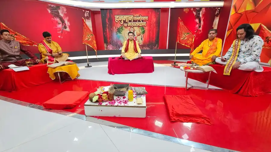 Gaurav presenting a live pooja programme in a TV studio
